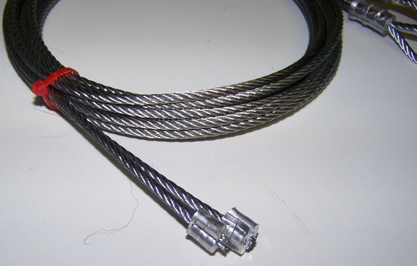 Frayed garage door cable in need of cable replacement
