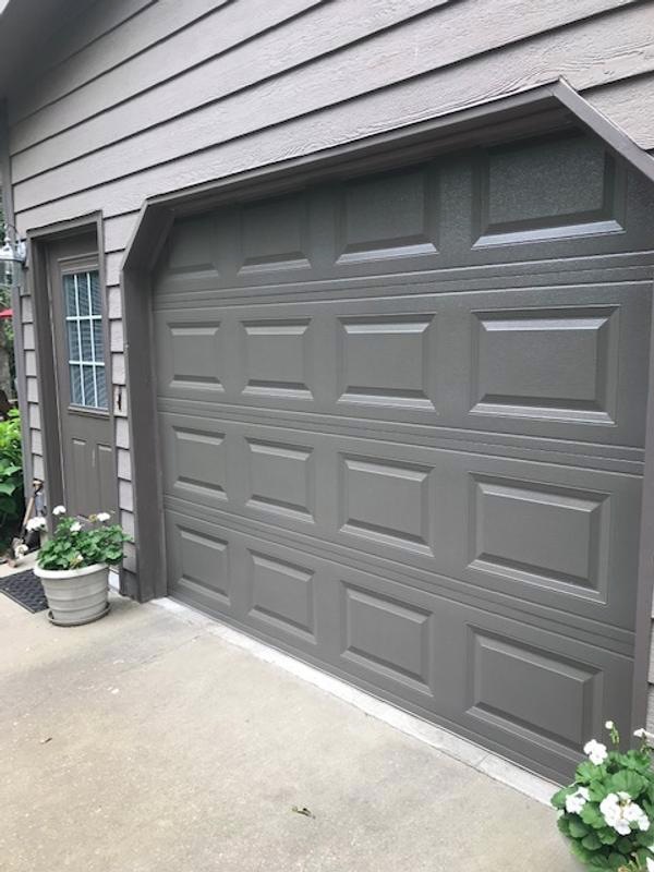 Raised panel short garage door with white finish